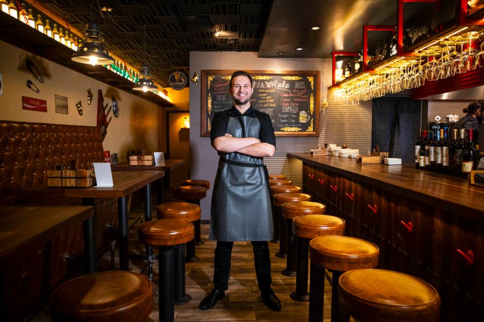 Cameron Mackintosh-Stewart, general manager of Casa de Raku, a tapas bar and restaurant, poses ...