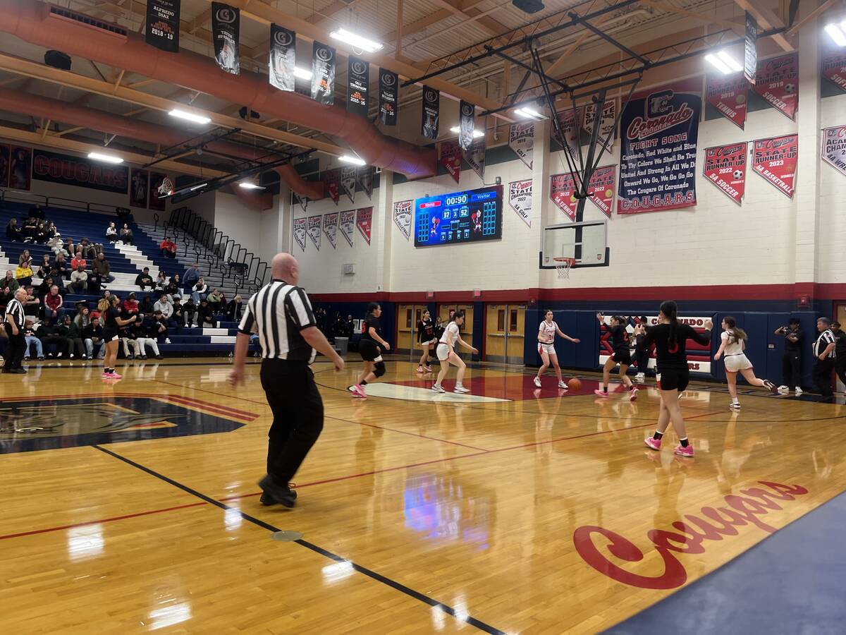 Liberty's girls basketball team looks to run its offense in the second half of its 63-49 win ov ...