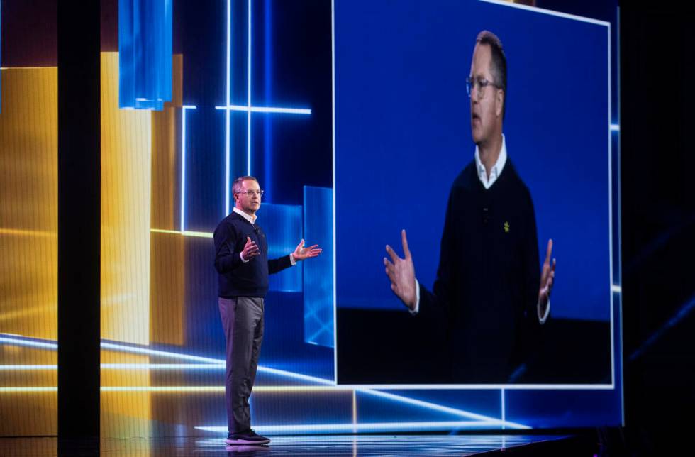 Walmart CEO Doug McMillon gives the keynote speech during the first day of CES at The Venetian ...