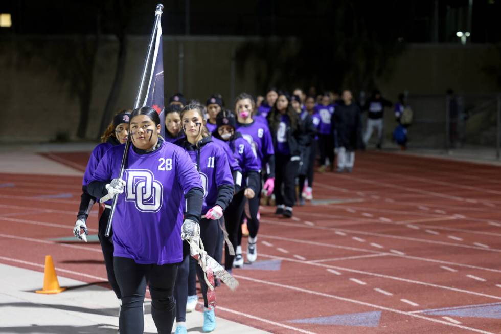 Desert Oasis players honor fallen teammate Ashari Hughes, 16, before their game against Las Veg ...