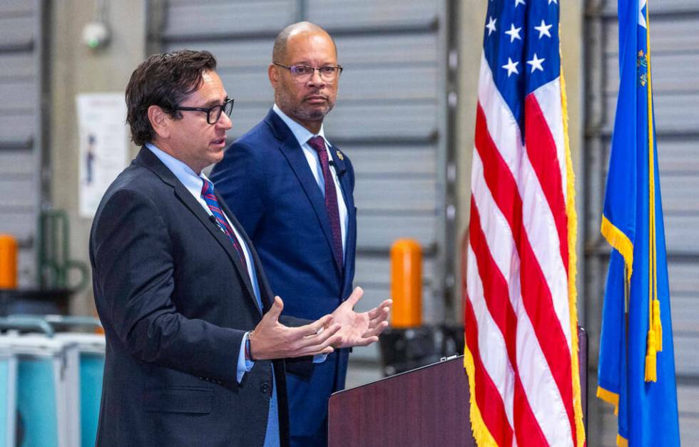 Nevada Secretary of State Francisco Aguilar. left, speaks beside Attorney General Aaron Ford ab ...