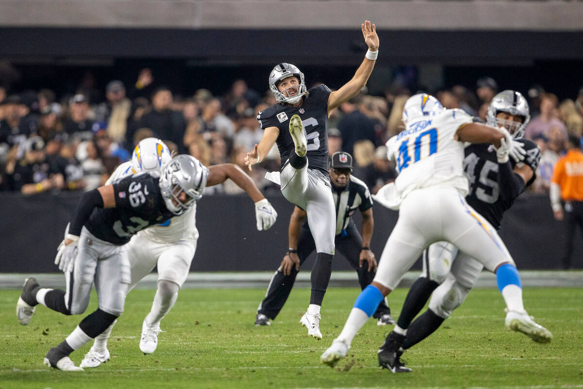 Raiders punter AJ Cole (6) punts during the second half of an NFL game against the Los Angeles ...