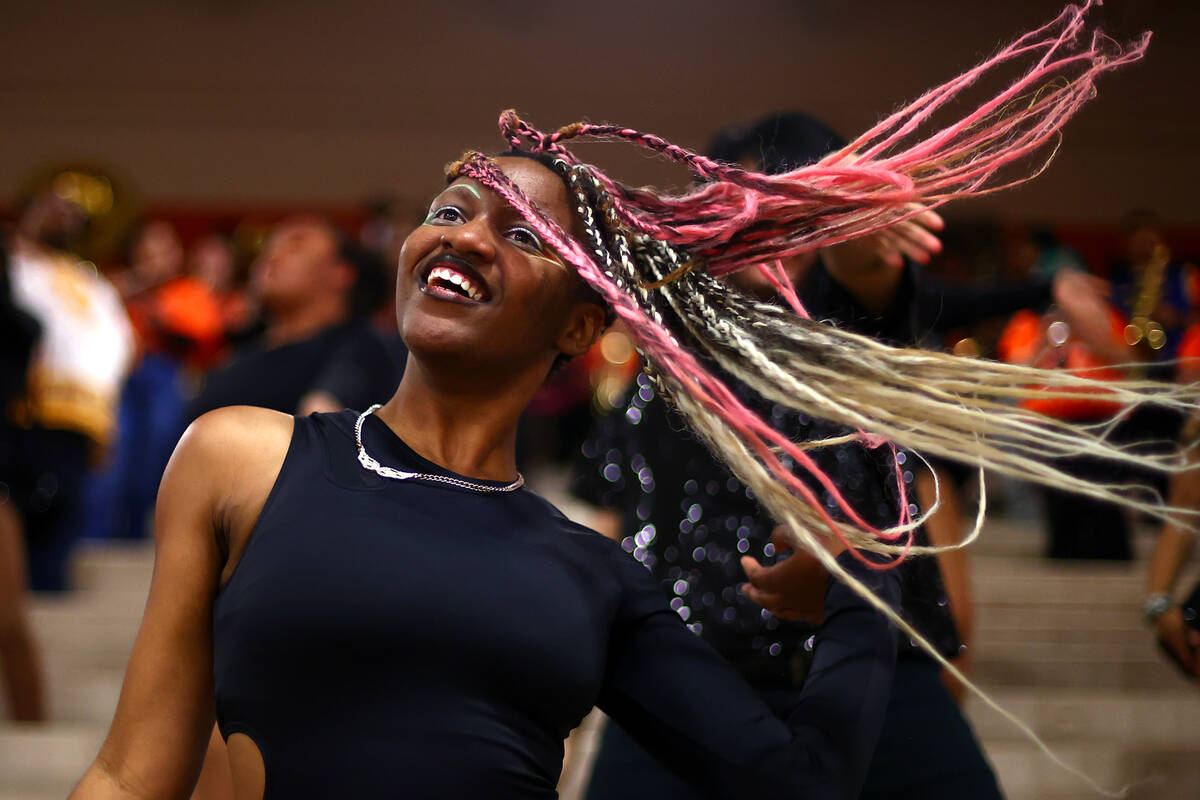 Mojave dancer Sage Porterfield performs during the second half of a high school basketball game ...