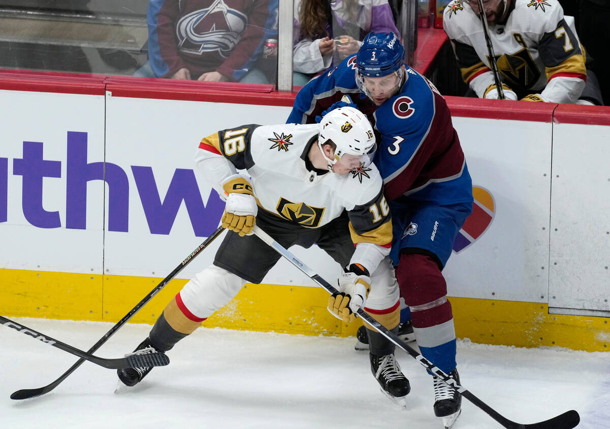 Vegas Golden Knights left wing Pavel Dorofeyev, left, vies for control of the puck against Colo ...