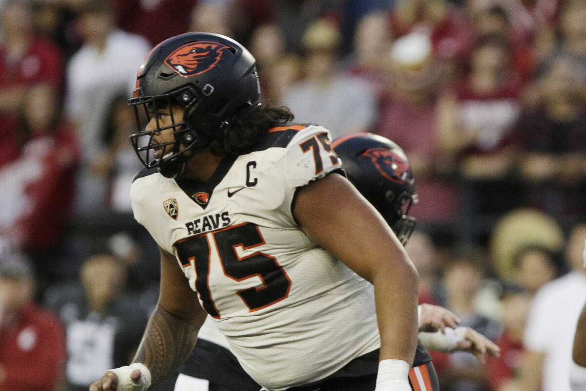 Oregon State offensive lineman Taliese Fuaga follows a play during the second half of an NCAA c ...