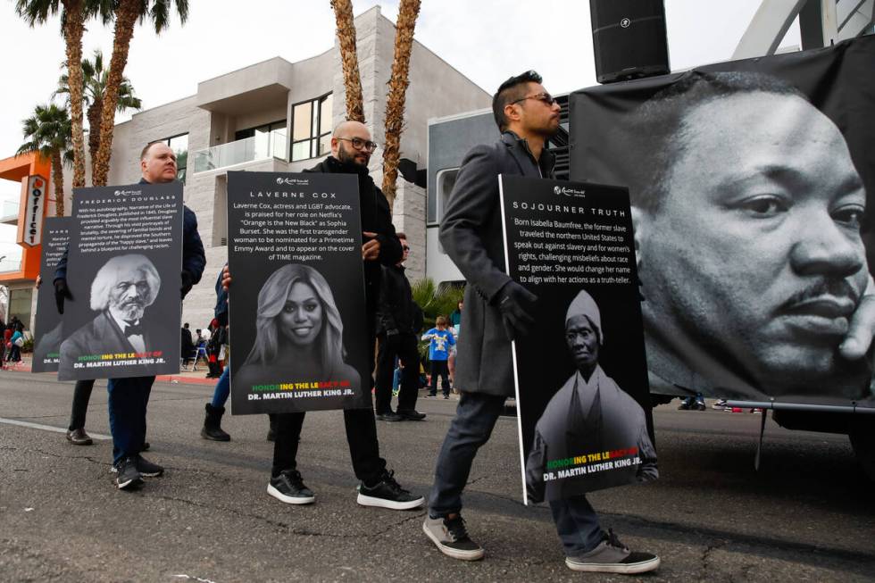 Resorts World employees march during the annual Martin Luther King Jr. Day parade on Monday, Ja ...