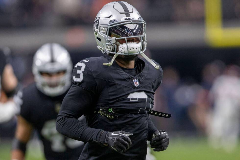 Raiders wide receiver DeAndre Carter (3) warms up before an NFL game against the Denver Broncos ...