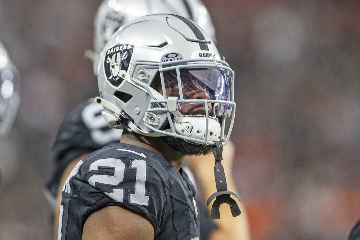 Raiders cornerback Amik Robertson (21) looks to a replay screen during the first half of an NFL ...