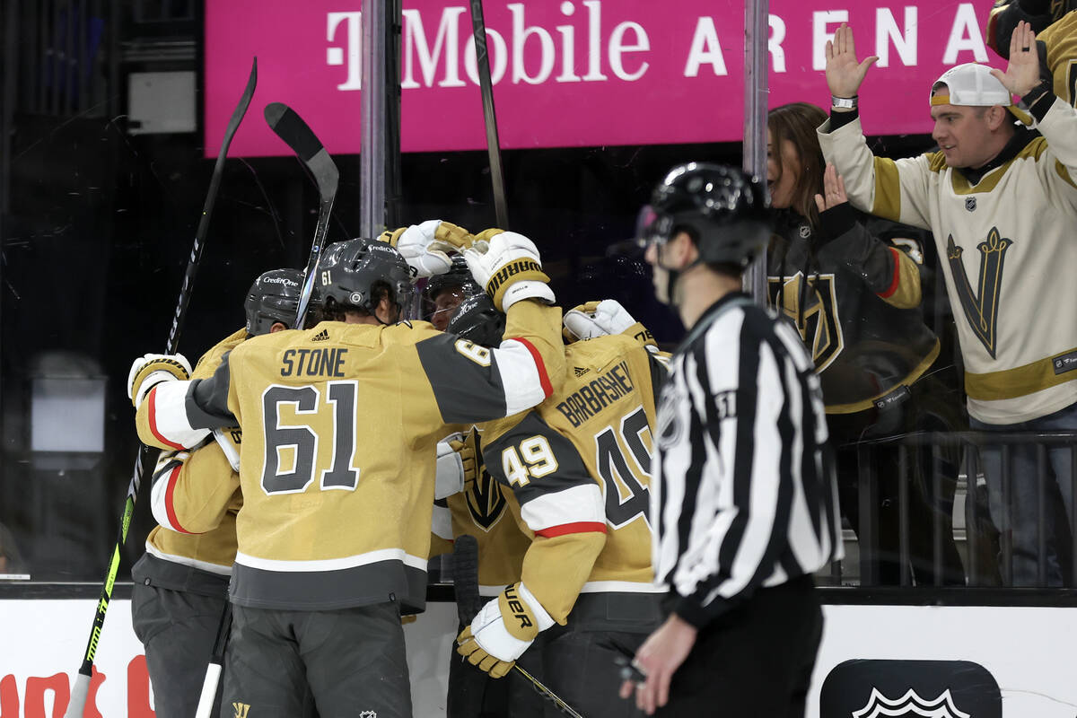 The Golden Knights celebrate center Jack Eichel’s goal during the third period of an NHL ...