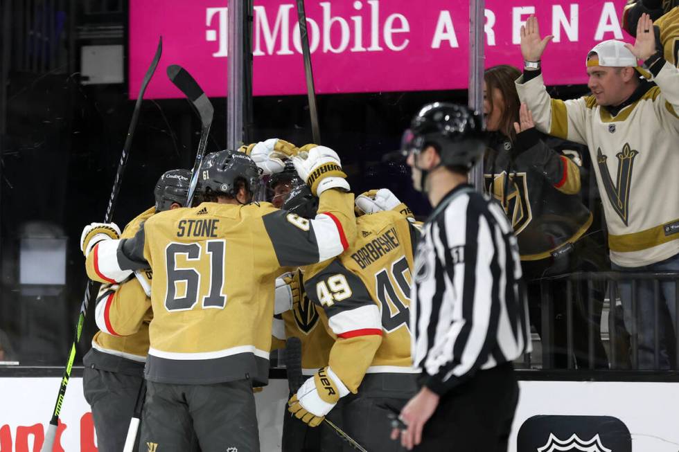 The Golden Knights celebrate center Jack Eichel’s goal during the third period of an NHL ...