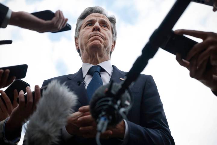 U.S. Secretary of State Antony Blinken speaks to members of the media before boarding his plane ...