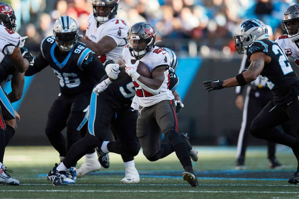 Tampa Bay Buccaneers running back Chase Edmonds (22) runs with the ball against the Carolina Pa ...