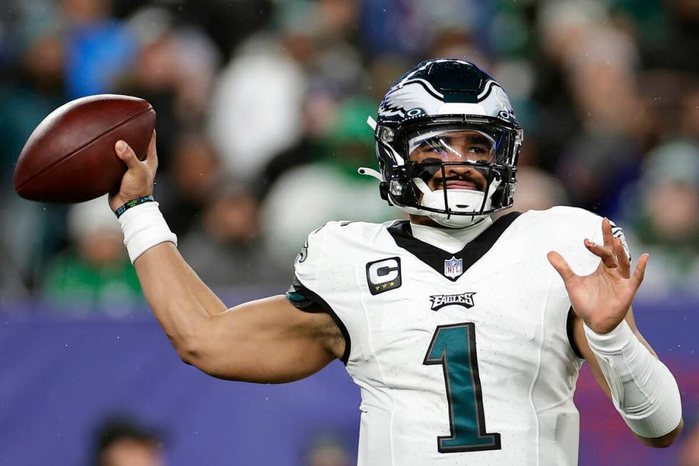 Philadelphia Eagles quarterback Jalen Hurts (1) in action against the New York Giants during an ...