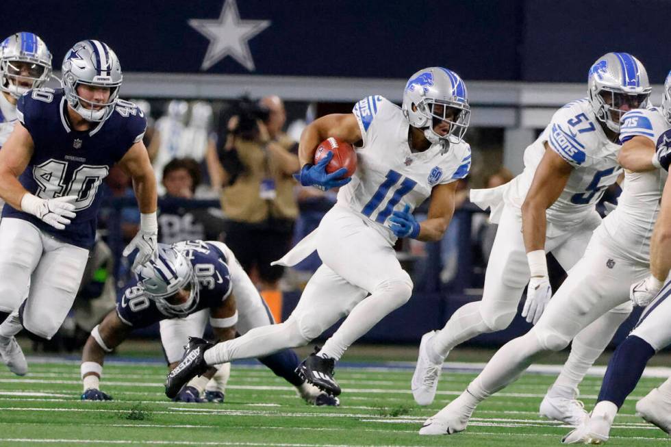 Detroit Lions wide receiver Kalif Raymond (11) returns a kick during an NFL football game in Ar ...