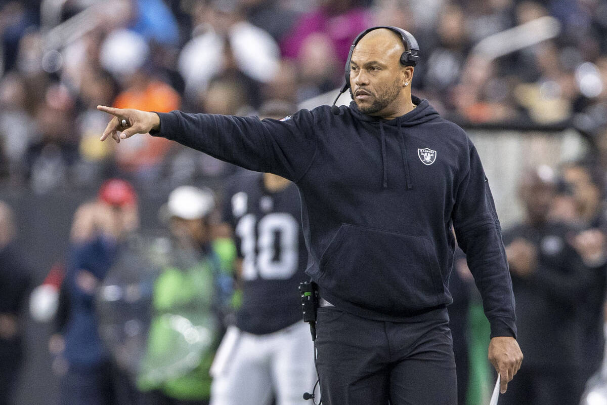 Raiders interim head coach Antonio Pierce reacts to a play during the first half of an NFL game ...