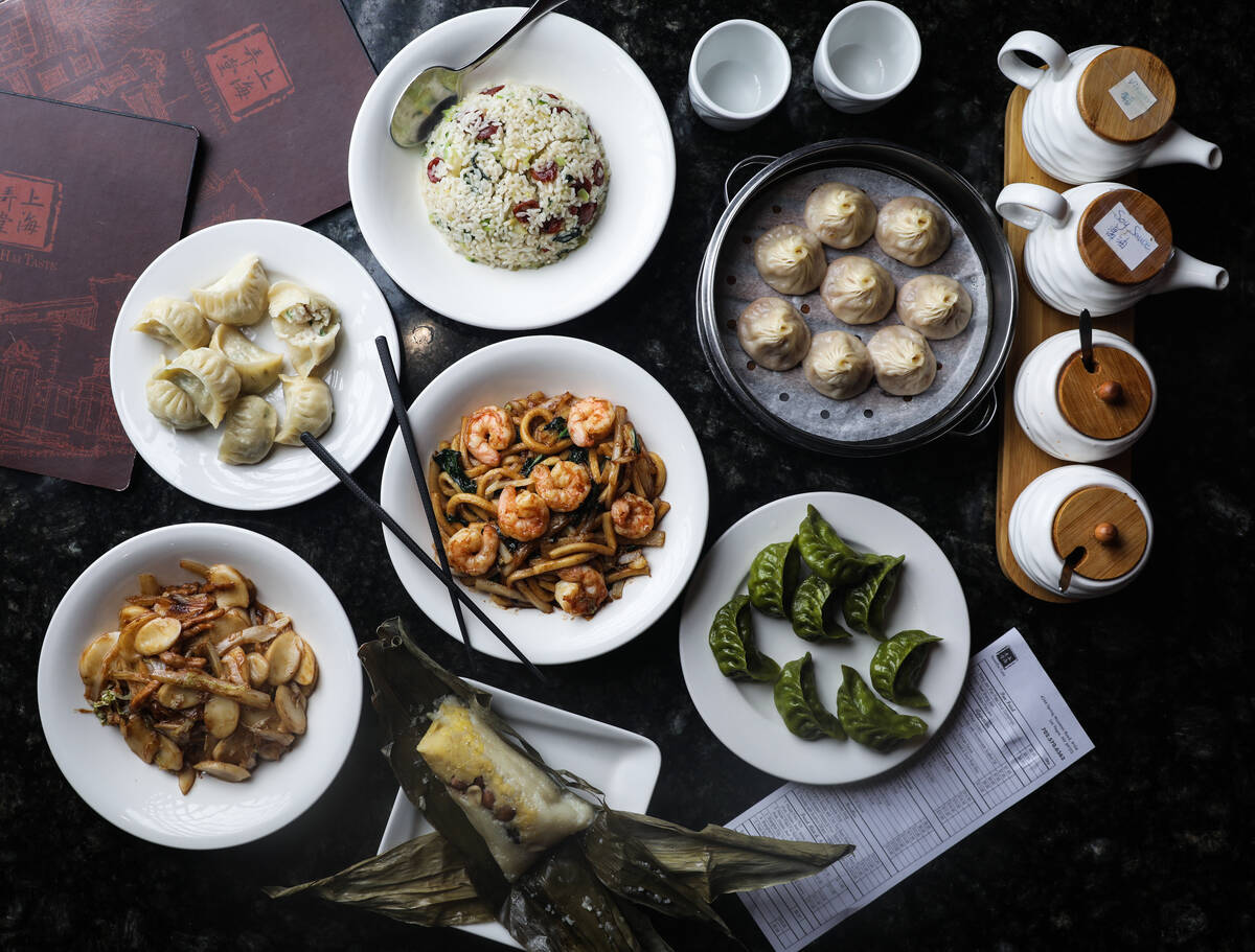 From bottom left going clockwise: Shanghai rice cake, steamed fish dumplings, fried rice with c ...