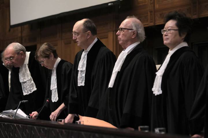 Judges start a hearing at the International Court of Justice in The Hague, Netherlands, Friday, ...