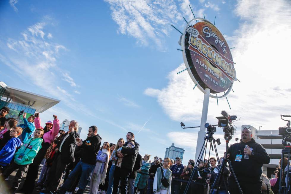 People cheer on competitors at the Siegel’s Bagelmania World Bagel Eating Championship a ...