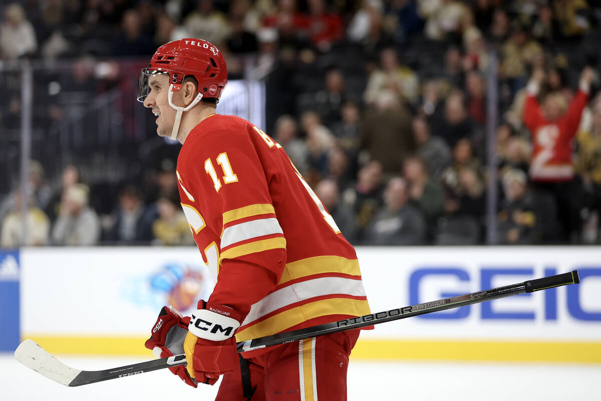 Flames center Mikael Backlund (11) skates toward the bench after scoring a goal during the seco ...