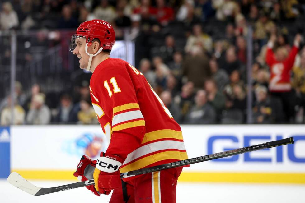 Flames center Mikael Backlund (11) skates toward the bench after scoring a goal during the seco ...