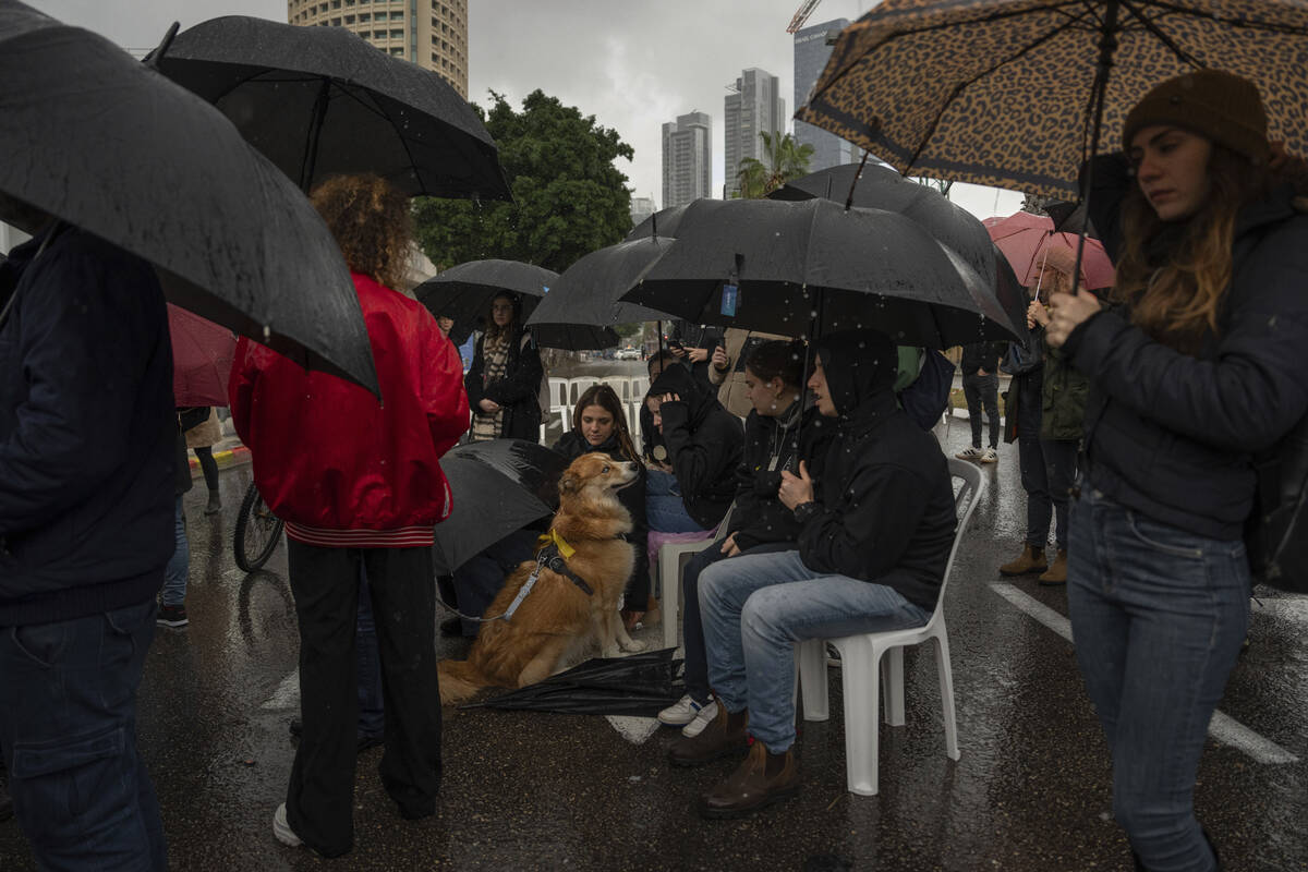 People attend a 24 hour rally calling for the release of the hostages kidnapped by Hamas milita ...