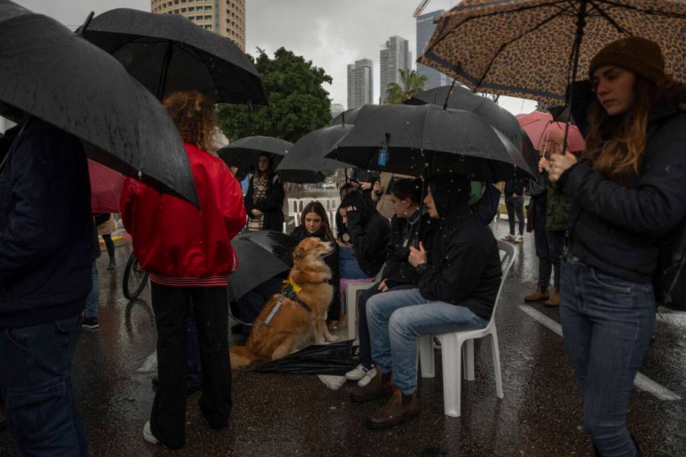 People attend a 24 hour rally calling for the release of the hostages kidnapped by Hamas milita ...