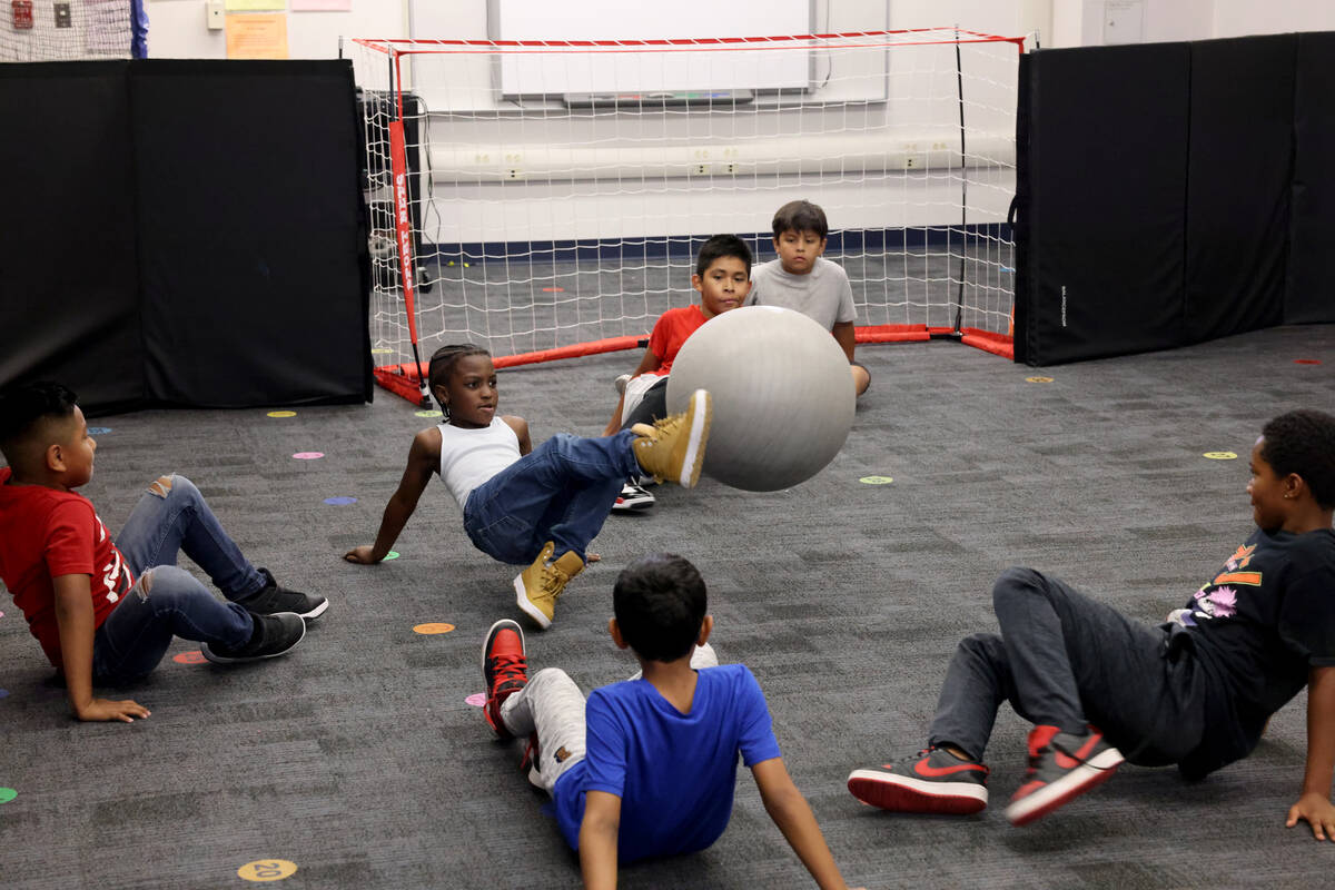 Students play crab soccer during the voluntary summer acceleration program at Hancock Elementar ...