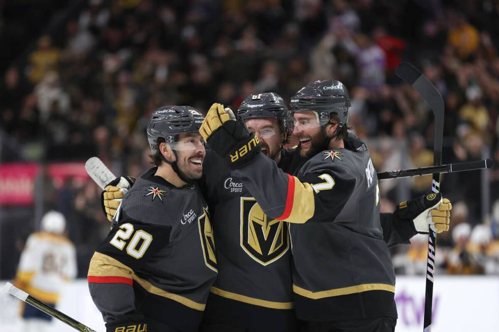 Vegas Golden Knights center Chandler Stephenson (20), right wing Mark Stone (61) and defenseman ...