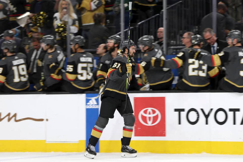 Vegas Golden Knights right wing Mark Stone (61) celebrates after his goal at the bench during t ...