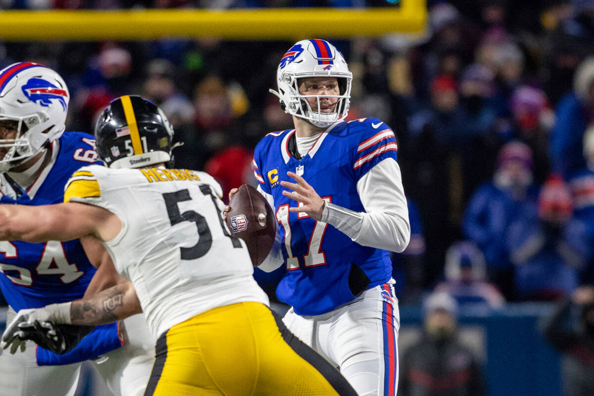 Buffalo Bills quarterback Josh Allen (17) looks to throw during an NFL wild-card playoff footba ...