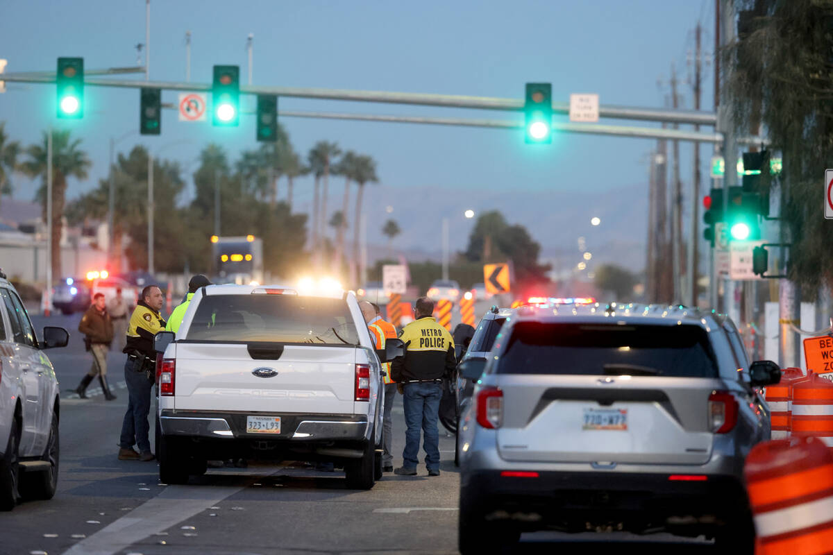 Police investigate a fatal crash involving a motorcycle and a RTC bus at Tropicana Avenue and J ...