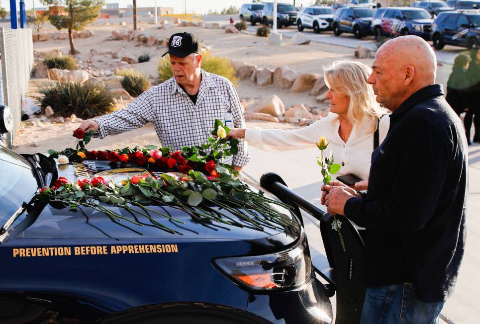 Toni and Mark Berry, left, the grandparents of CCSD Police Officer Andrew Craft’s girlfr ...