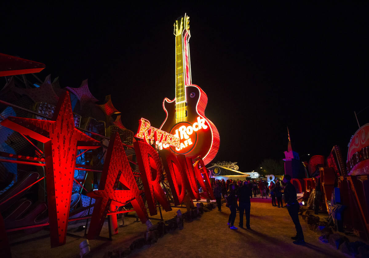 The Hard Rock Cafe guitar sign is illuminated for the first time in public during a special eve ...