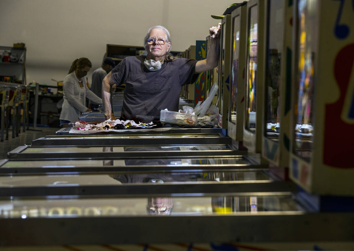 Pinball Hall of Fame owner Tim Arnold still repairs his machines at the new location across fro ...