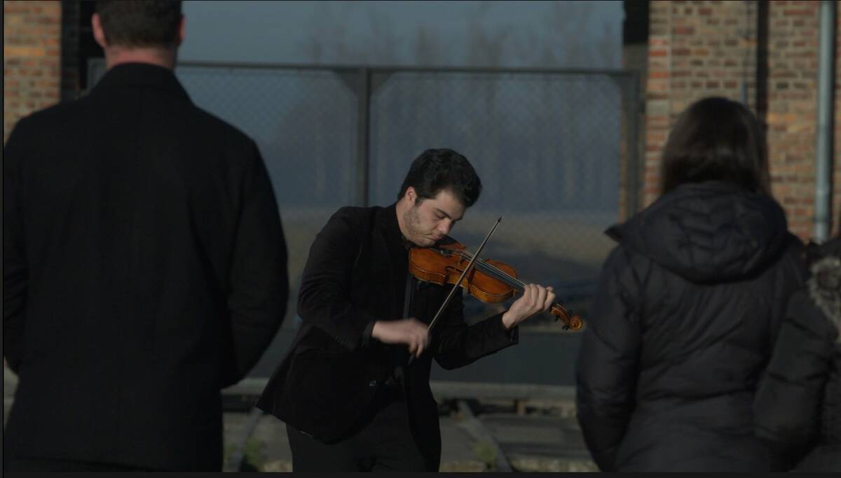 Erik Ghukasyan performs Shony Alex Braun's symphony at Auschwitz in "Symphony of the Holocaust. ...