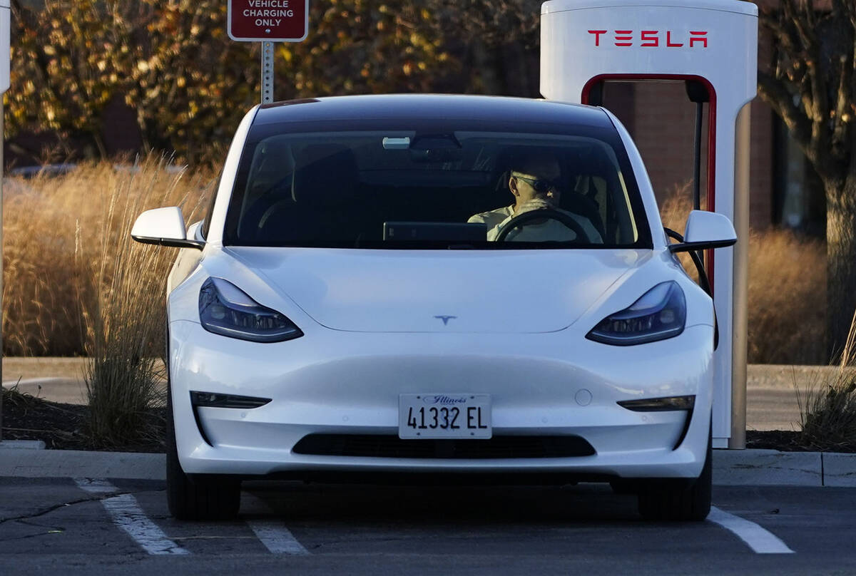 A Tesla electric vehicle is seen at a Tesla electric vehicle charging station at Willow Festiva ...