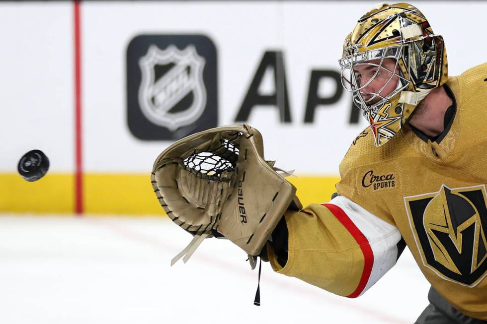 Golden Knights goaltender Logan Thompson (36) prepares to make a glove save during the second p ...