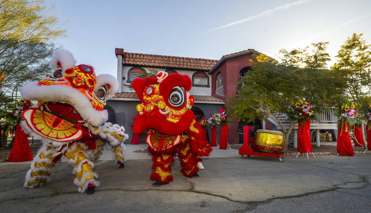 Lion dancers with the Lohan School of Shaolin perform outside for the opening ceremony of the B ...