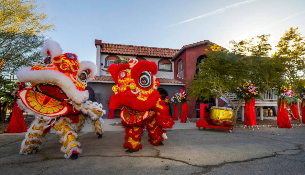 Lion dancers with the Lohan School of Shaolin perform outside for the opening ceremony of the B ...