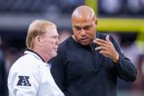 Raiders owner Mark Davis chats with interim head coach Antonio Pierce during warmups before the ...