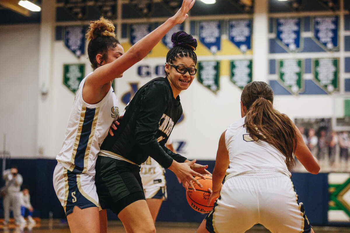 Democracy Prep forward Brooklyn Williams (32) keeps the ball in her possession during a game ag ...