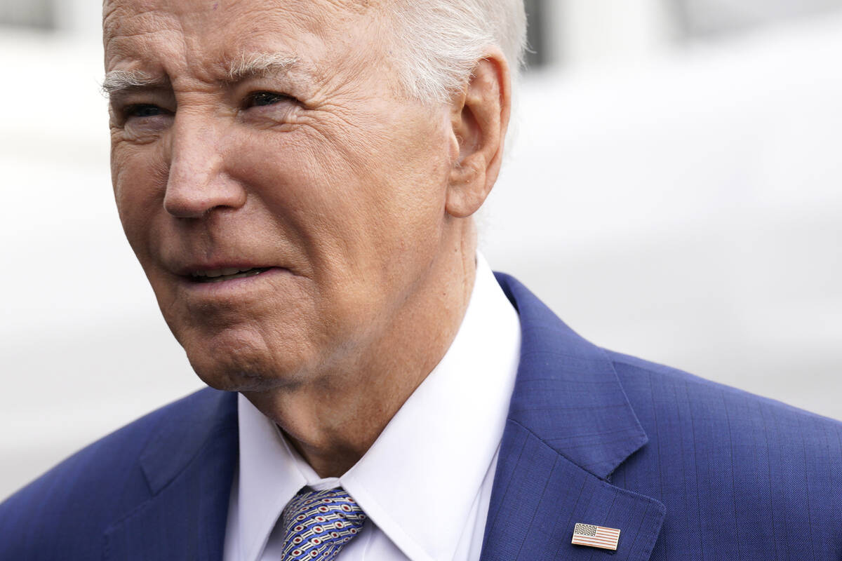 President Joe Biden speaks to the media before boarding Marine One on the South Lawn of the Whi ...