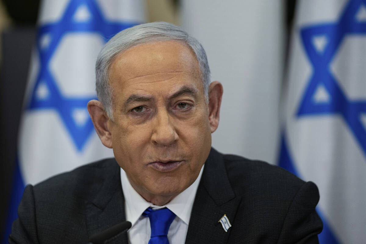 Israeli Prime Minister Benjamin Netanyahu chairs a cabinet meeting at the Kirya military base, ...