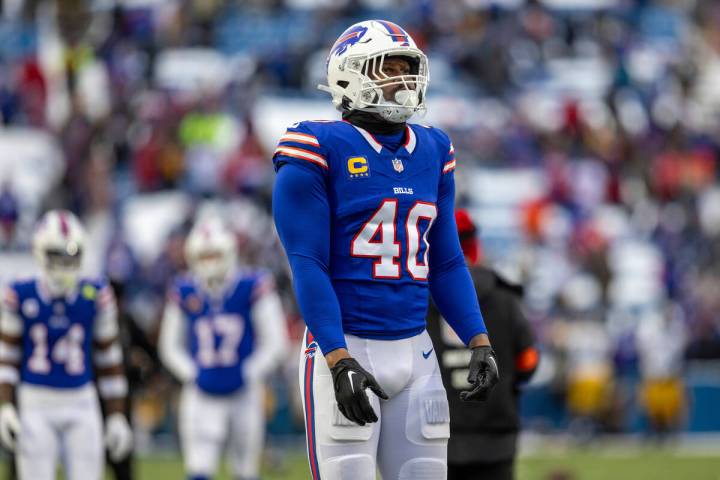 Buffalo Bills linebacker Von Miller warms up before an NFL wild-card playoff game, Monday, Jan. ...