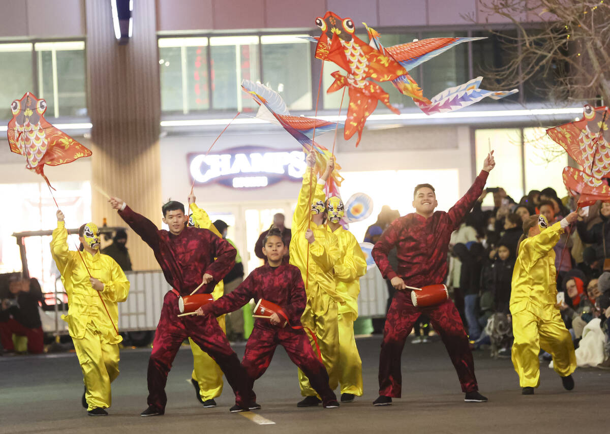 Best Agency performers entertain the crowd during Downtown Summerlin's Lunar New Year Parade on ...