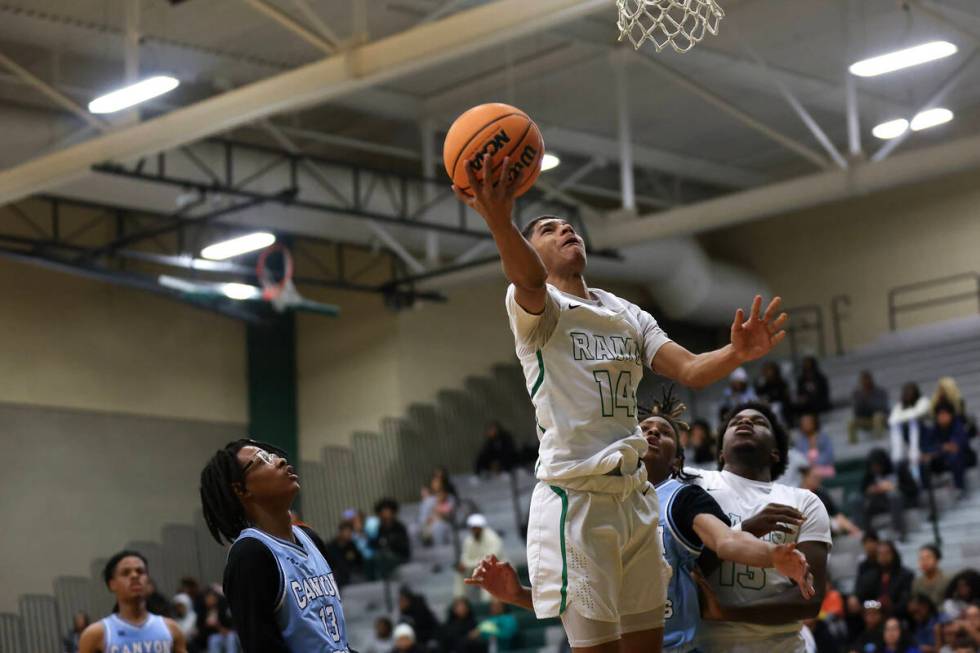 Rancho guard Caleb Roston shoots a layup over Canyon Springs during the first half of a high sc ...