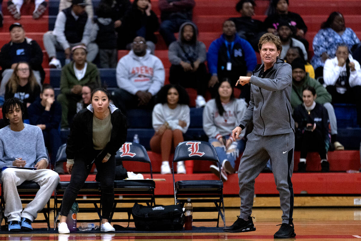 Centennial head coach Karen Weitz shouts from the sidelines during the second half of a boys hi ...