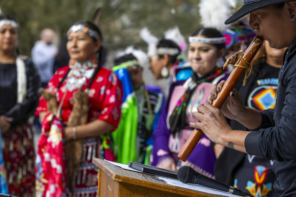 Davis Thunderhawk plays the flute during a Super Bowl "Green Week" event at the Las V ...