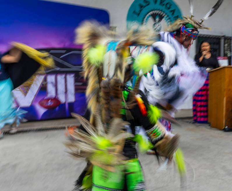 Intertribal dancers perform during a Super Bowl "Green Week" event at the Las Vegas I ...