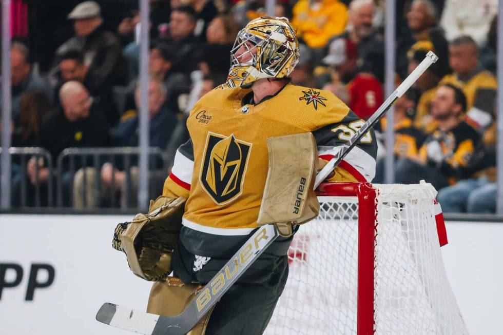 Golden Knights goaltender Logan Thompson (36) leans on the net during a game agains the Pittsbu ...